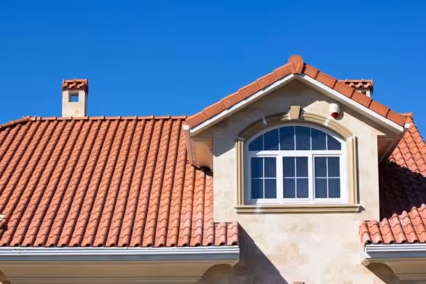 Clay tiles considered for re-roofing on a budget