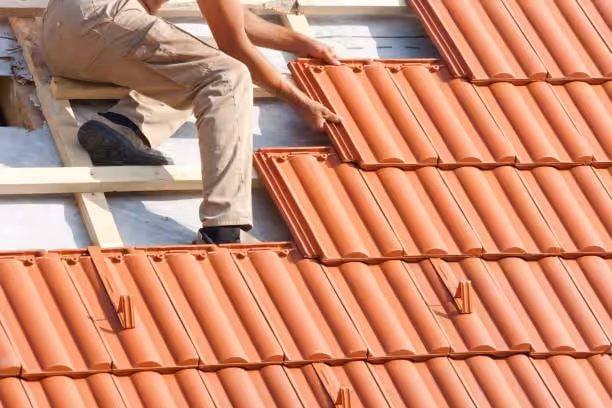A man who learn how to install a tile roof in florida